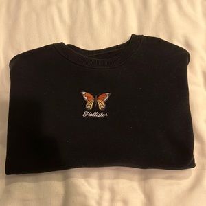 Hollister black cropped crewneck with embroidered butterfly